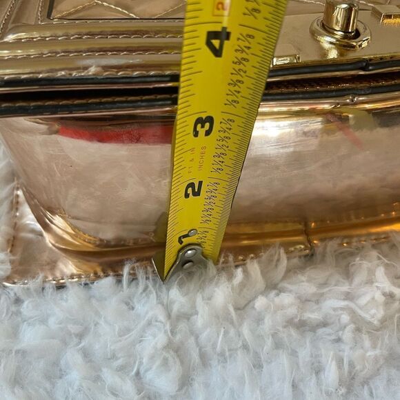 Metallic Rose Gold quilted crossbody bag with adjustable strap. - Picture 11 of 11